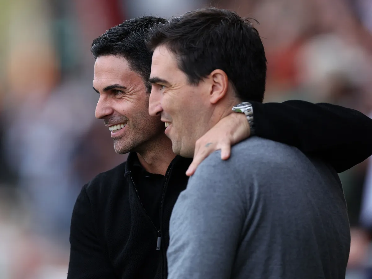 Arsenal's Spanish manager Mikel Arteta (L) and Bournemouth's Spanish manager Andoni Iraola greet each other before the English Premier League football match between Bournemouth and Arsenal at the Vitality Stadium in Bournemouth, southern England on September 30, 2023. (Photo by Adrian DENNIS / AFP) / RESTRICTED TO EDITORIAL USE. No use with unauthorized audio, video, data, fixture lists, club/league logos or 'live' services. Online in-match use limited to 120 images. An additional 40 images may be used in extra time. No video emulation. Social media in-match use limited to 120 images. An additional 40 images may be used in extra time. No use in betting publications, games or single club/league/player publications. / 