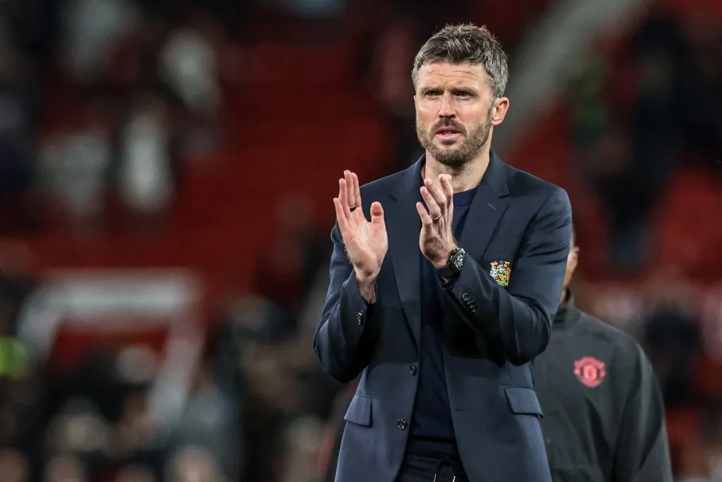 Michael Carrick, manager of Manchester United, applauds the fans after the game during the Premier League match between Manchester United and Brentford at Old Trafford, Manchester, United Kingdom, on April 27, 2026. (Photo by Mark Cosgrove/News Images/NurPhoto) (Photo by News Images / NurPhoto via AFP)