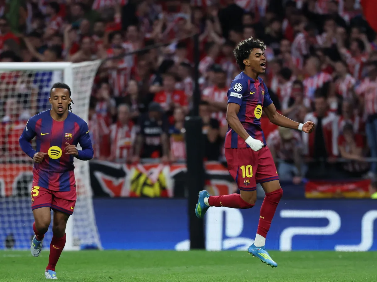 Barcelona's Spanish forward #10 Lamine Yamal celebrates scoring his team's first goal during the UEFA Champions League quarter final second leg football match between Club Atletico de Madrid and FC Barcelona at Metropolitano Stadium in Madrid on April 14, 2026. (Photo by Thomas COEX / AFP)