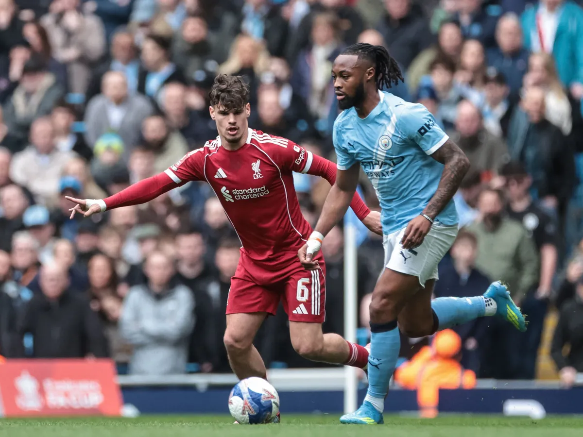 Milos Kerkez of Liverpool tracks Antonie Semenyo of Manchester City during the Emirates FA Cup Quarter-Final match between Manchester City and Liverpool at Etihad Stadium in Manchester, United Kingdom, on April 4, 2026. (Photo by Mark Cosgrove/News Images/NurPhoto) (Photo by News Images / NurPhoto via AFP)