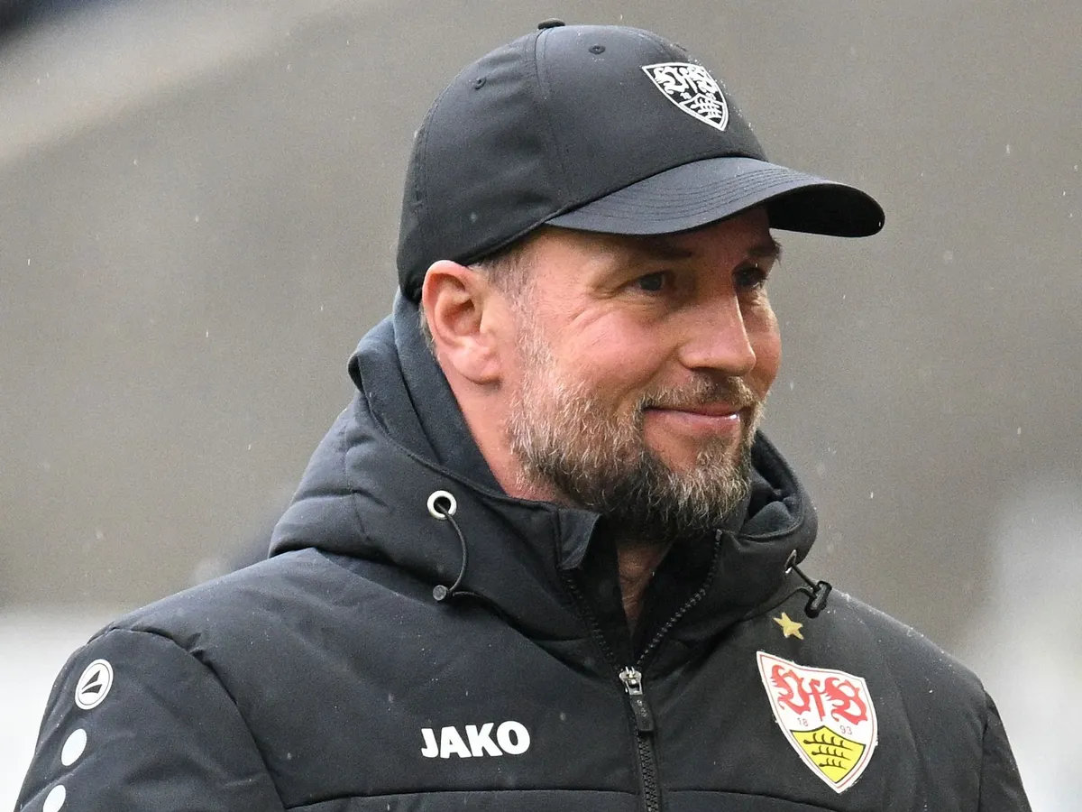 Stuttgart's German head coach Sebastian Hoeness is interviewed prior to the German first division Bundesliga football match between VfB Stuttgart and Hamburger SV in Stuttgart, southwestern Germany on April 12, 2026. (Photo by THOMAS KIENZLE / AFP) / DFL REGULATIONS PROHIBIT ANY USE OF PHOTOGRAPHS AS IMAGE SEQUENCES AND/OR QUASI-VIDEO