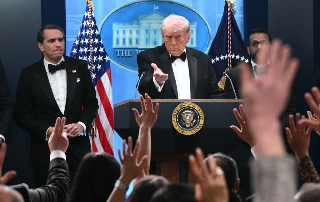 US President Donald Trump takes questions during a press briefing in the Brady Briefing Room at the White House in Washington, DC, shortly after a shooting incident at the White House Correspondents Dinner on April 25, 2026. US President Donald Trump said April 25 he would give a press conference from the White House press briefing room, shortly after a shooting incident at a gala dinner in Washington. The press conference is set to take place shortly after 10 p.m. (0200 GMT), Trump wrote on his Truth Social platform, adding: "The First Lady, plus the Vice President, and all Cabinet members, are in perfect condition." (Photo by Mandel NGAN / AFP)
