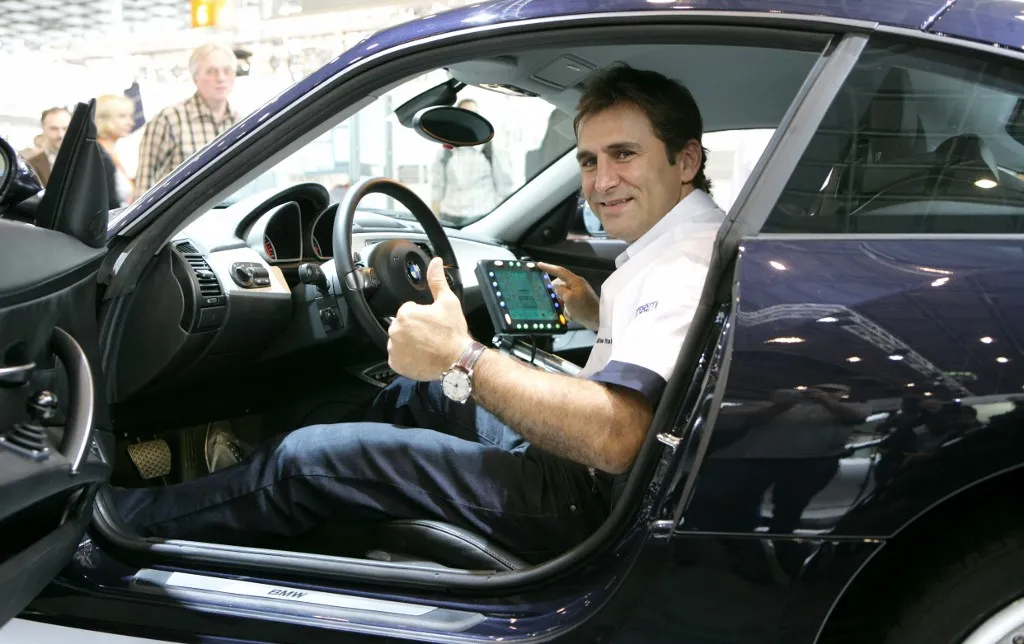 Italian touring car pilot Alessandro Zanardi, whose legs were amputated after a heavy crash, sits in a disabled friendly BMW Z4 at the Rehacare trade fair in Duesseldorf, Germany, 03 October 2007. The world's largest public trade fair for care and rehabilitation products runs until 06 October. Photo: Rolf Vennenbernd (Photo by ROLF VENNENBERND / dpa Picture-Alliance via AFP)
