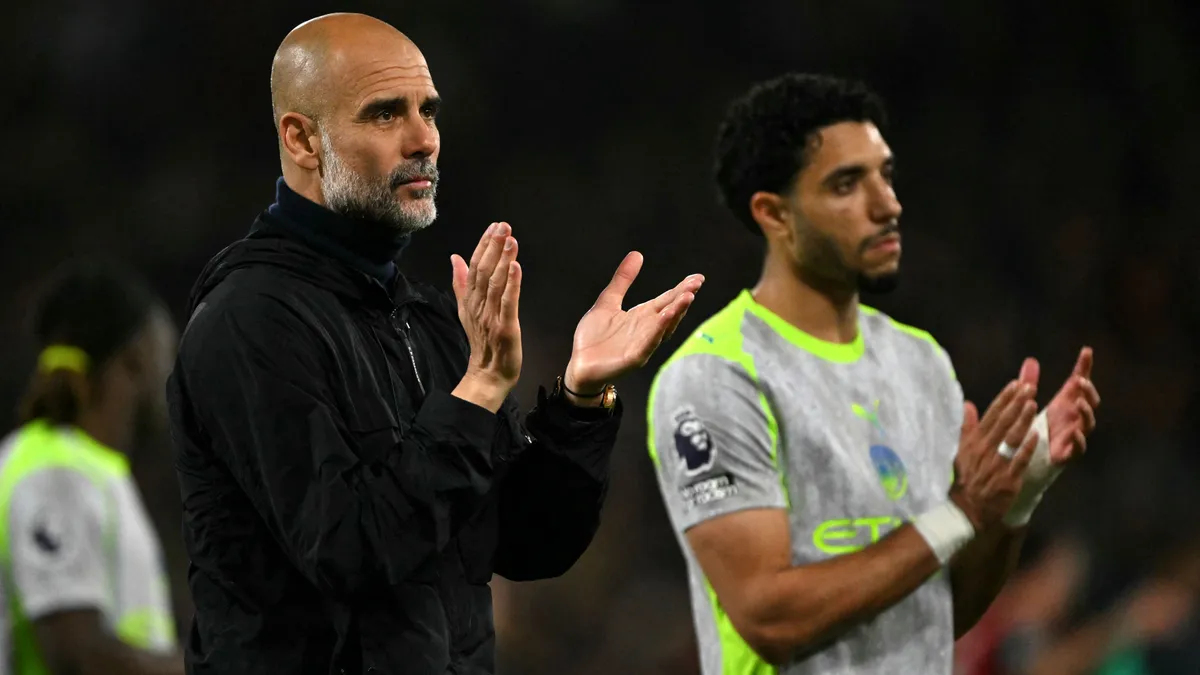 Manchester City's Spanish manager Pep Guardiola applauds the fans following the English Premier League football match between Bournemouth and Manchester City at the Vitality Stadium in Bournemouth, southern England on May 19, 2026. (Photo by Glyn KIRK / AFP) / RESTRICTED TO EDITORIAL USE. No use with unauthorized audio, video, data, fixture lists, club/league logos or 'live' services. Online in-match use limited to 120 images. An additional 40 images may be used in extra time. No video emulation. Social media in-match use limited to 120 images. An additional 40 images may be used in extra time. No use in betting publications, games or single club/league/player publications. / 