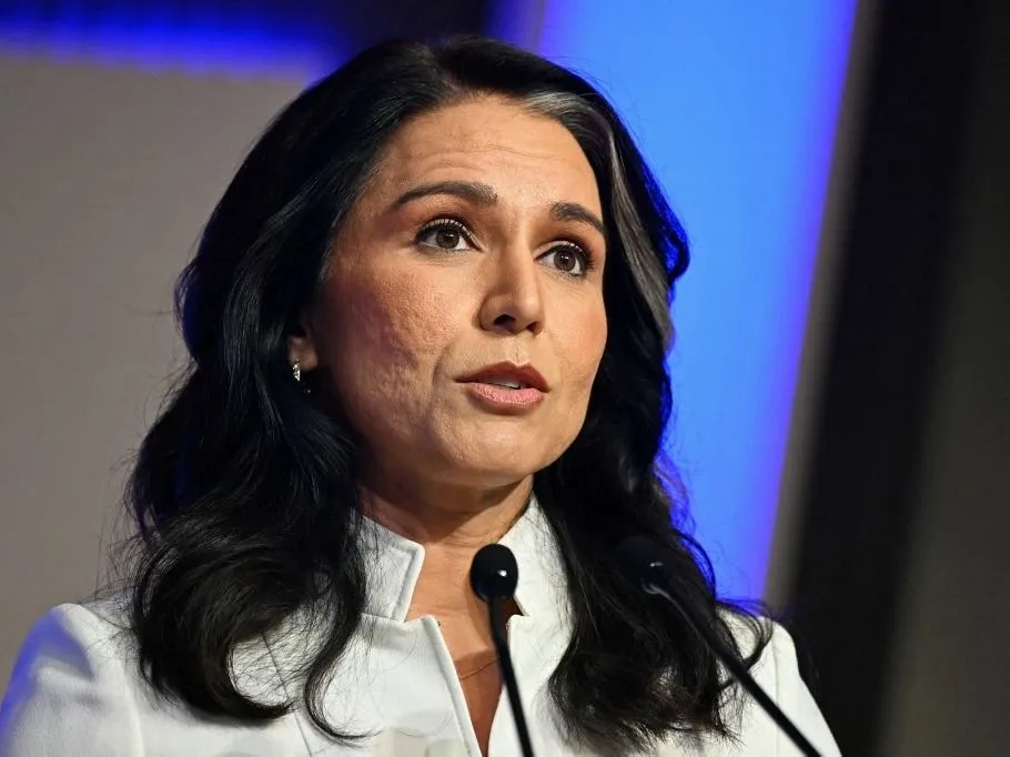 (FILES) US Director of National Intelligence Tulsi Gabbard speaks during the Raisina Dialogue, a multilateral conference in New Delhi on March 18, 2025. US intelligence chief Tulsi Gabbard announced her resignation on May 22, 2026, ending the tenure of a long-term contrarian who appeared to be at odds with President Donald Trump over the Iran war. Gabbard said in a letter to Trump posted on X that she was quitting as Director of National Intelligence to look after her husband following his diagnosis with an "extremely rare form of bone cancer." (Photo by Sajjad HUSSAIN / AFP)