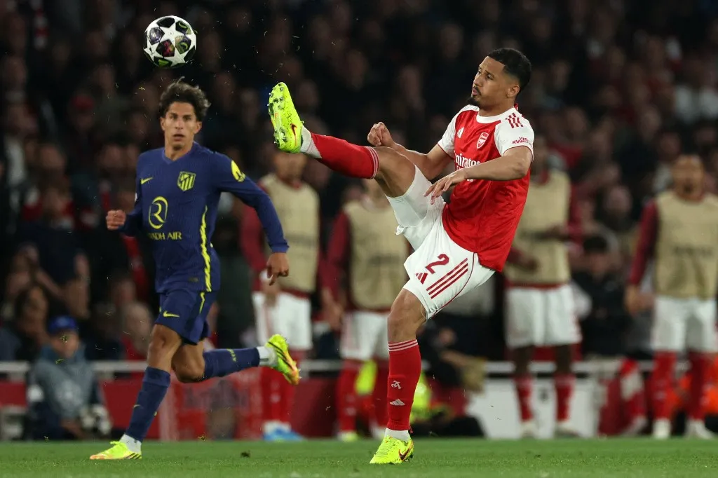 Arsenal's French defender #02 William Saliba clears the ball during the UEFA Champions League second-leg semi-final football match between Arsenal and Atletico Madrid at the Emirates Stadium in north London on May 5, 2026. (Photo by Adrian Dennis / AFP)