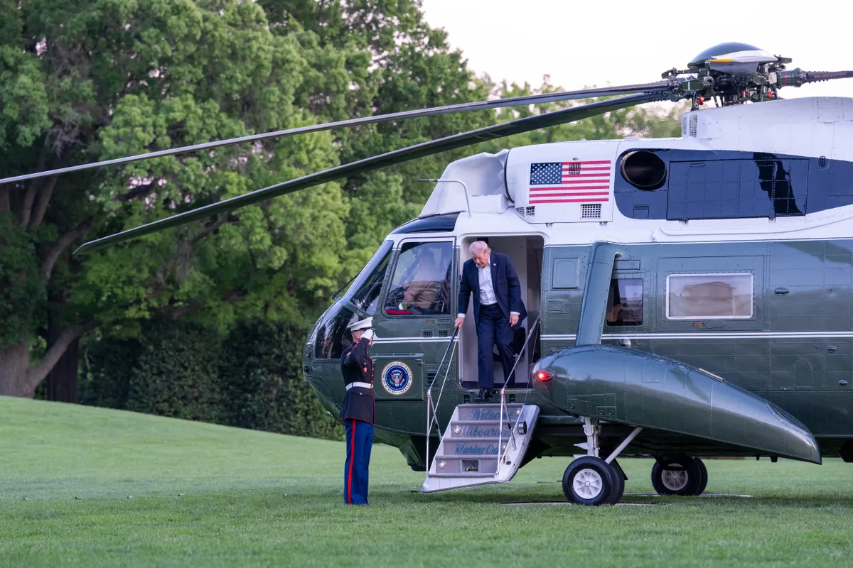 President Donald Trump and his son Donald Trump Junior arrive at the White House after a weekend trip to Florida on May 3, 2026. (Photo by Andrew Leyden/NurPhoto) (Photo by Andrew Leyden / NurPhoto via AFP)