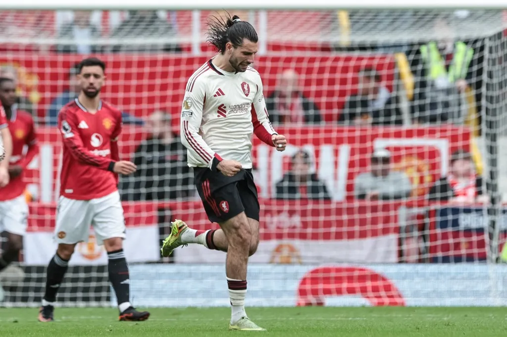 Dominik Szoboszlai of Liverpool celebrates his goal to make it 2-1 during the Premier League match between Manchester United and Liverpool at Old Trafford, Manchester, United Kingdom, on May 3, 2026. (Photo by Mark Cosgrove/News Images/NurPhoto) (Photo by News Images / NurPhoto via AFP)