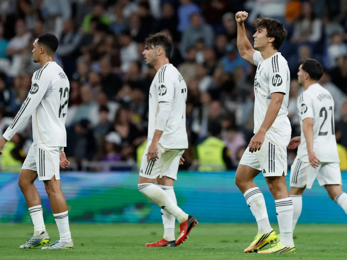 Real Madrid's Spanish forward #16 Gonzalo Garcia (2R) celebrates scoring the opening goal during the Spanish league football match between Real Madrid CF and Real Oviedo at Santiago Bernabeu Stadium in Madrid on May 14, 2026. (Photo by Oscar DEL POZO / AFP)