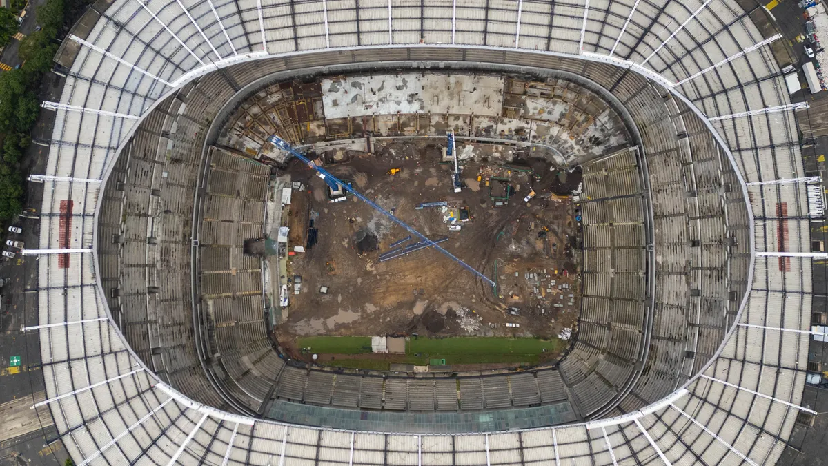 MEXICO CITY, MEXICO - JUNE 24: An aerial view of the Azteca Stadium during the renovation works ahead of the 2026 FIFA World Cup, in Mexico City, Mexico on June 24, 2025. Mexico City's iconic Azteca Stadium which hosted the 1970 and 1986 World Cup finals is expected to reopen in March next year and it will be the venue for the opening match of the FIFA World Cup 2026. The transformation of the stadium will include a hybrid field, new changing rooms, hospitality zones and new seats, among others. Daniel Cardenas / Anadolu (Photo by Daniel Cardenas / Anadolu via AFP)