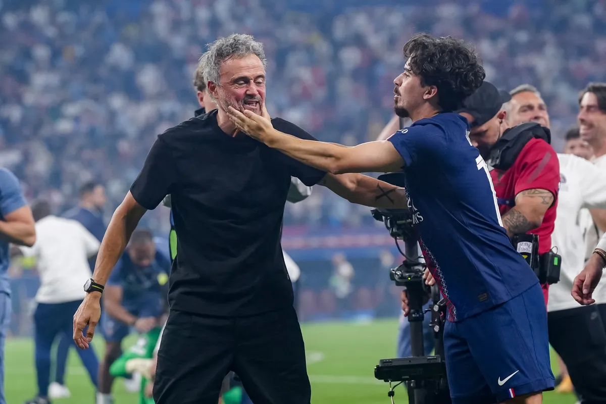 Luis Enrique and Vitinha Head Coach of Paris Saint-Germain FC celebrates the victory at the end of the UEFA Champions League Final match between Paris Saint-Germain FC and Arsenal FC at Puskas Arena on May 30, 2026 in Budapest, Hungary (Photo by Giuseppe Maffia/NurPhoto) (Photo by Giuseppe Maffia / NurPhoto via AFP)