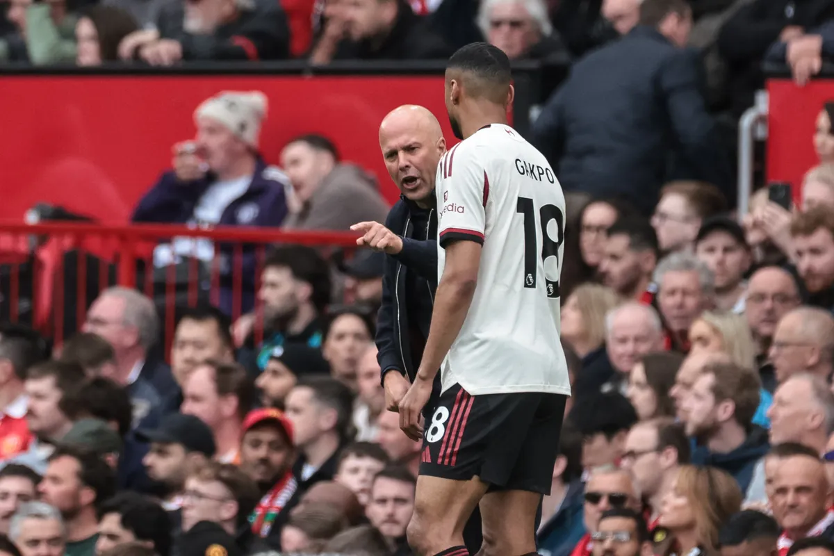 Arne Slot, manager of Liverpool, shouts instructions to Cody Gakpo of Liverpool during the Premier League match between Manchester United and Liverpool at Old Trafford, Manchester, United Kingdom, on May 3, 2026. (Photo by Mark Cosgrove/News Images/NurPhoto) (Photo by News Images / NurPhoto via AFP)