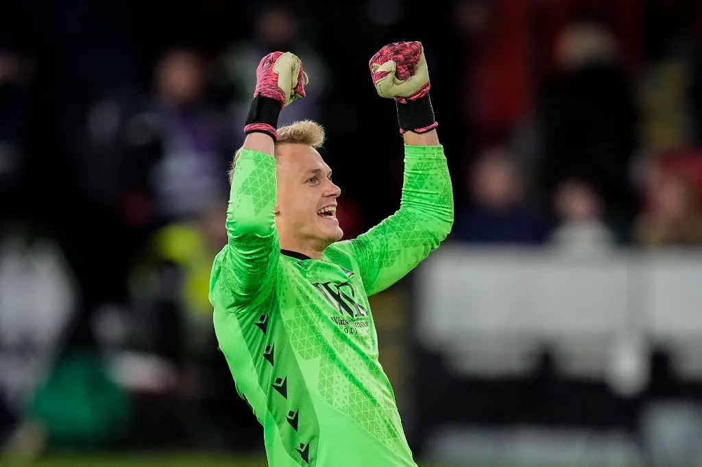 Blackburn Rovers goalkeeper Balazs Toth celebrates as Yuki Ohashi of Blackburn Rovers scores to make it 0-3 during the Sky Bet Championship match between Sheffield United and Blackburn Rovers at Bramall Lane in Sheffield, United Kingdom, on April 22, 2026. (Photo by Maynard Manyowa/News Images/NurPhoto) (Photo by News Images / NurPhoto via AFP)