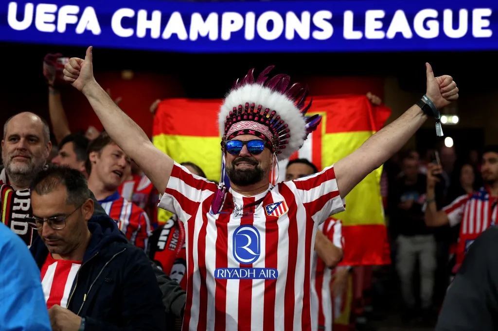 A fan reacts before the UEFA Champions League second-leg semi-final football match between Arsenal and Atletico Madrid at the Emirates Stadium in north London on May 5, 2026. (Photo by Adrian Dennis / AFP)