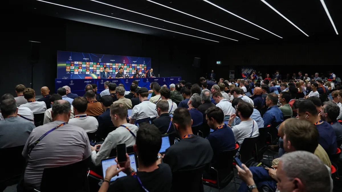 Journalists attend the MD-1 press conference of Paris Saint-Germain on May 29, 2026, the eve of the UEFA Champions League final football match between Paris Saint-Germain (PSG) and Arsenal at the Puskas Arena in Budapest. Paris Saint-Germain (PSG) face Arsenal in the UEFA Champions League final football match on May 30, 2026 in Budapest. (Photo by FRANCK FIFE / POOL / AFP)