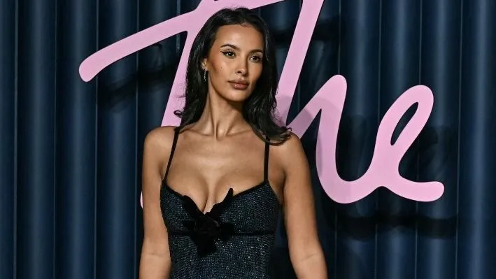 British television personality Maya Jama poses on the red carpet upon arrival at the 2025 Fashion Awards at the Royal Albert Hall in London on December 1, 2025. (Photo by Ben STANSALL / AFP) / --- RESTRICTED TO EDITORIAL USE ---