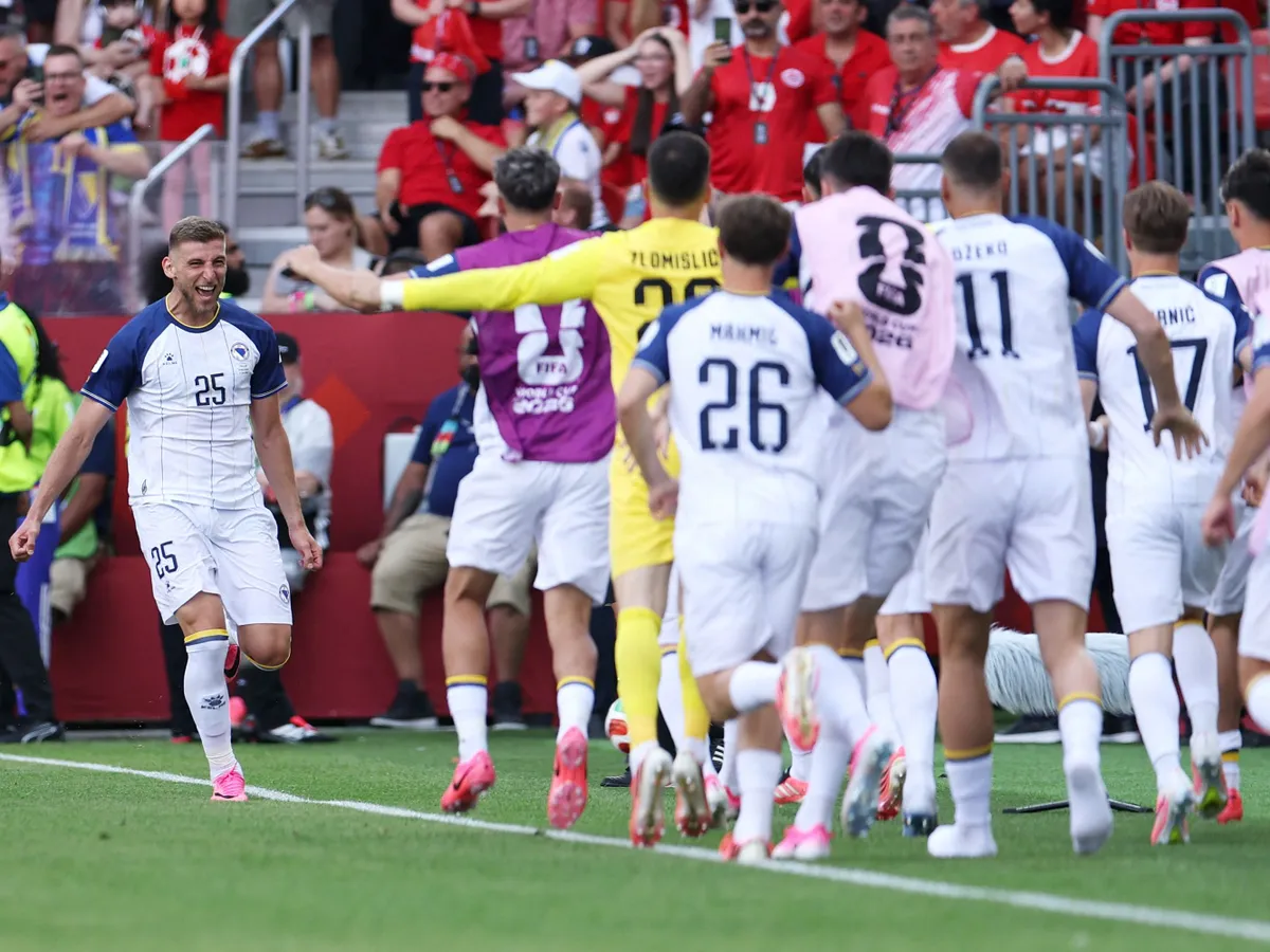 TORONTO, ONTARIO - JUNE 12: Jovo Lukic #25 of Bosnia and Herzegovina celebrates scoring his team's first goal during the FIFA World Cup 2026 Group B match between Canada and Bosnia and Herzegovina at Toronto Stadium on June 12, 2026 in Toronto, Ontario.   Francois Nel/Getty Images/AFP (Photo by Francois Nel / GETTY IMAGES NORTH AMERICA / Getty Images via AFP)