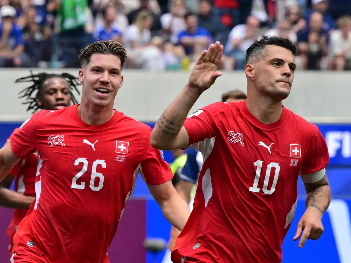Switzerland's midfielder #10 Granit Xhaka celebrates scoring his team's fourth goal during the 2026 World Cup Group B football match between Switzerland and Bosnia and Herzegovina at Los Angeles Stadium in Inglewood on June 18, 2026.  (Photo by Frederic J. Brown / AFP)