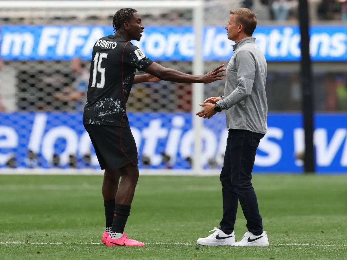 Canada's defender #15 Moise Bombito gestures to US head coach Jesse Marsch at the halftime of the 2026 World Cup round of 32 football match between South Africa and Canada at the Los Angeles Stadium in Inglewood on June 28, 2026. (Photo by ETIENNE LAURENT / AFP)