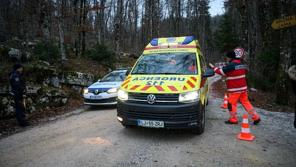 An ambulance leaves the area of the Krizna Cave where five people were rescued from floodwaters caused by rainfall, near the village of Bloska Polica, some 40 km south of Ljubljana, Slovenia, on January 8, 2024. Five people were trapped in a cave in central Slovenia since January 6, after heavy rains caused flooding. A family of three adults with two guides had begun a tourist visit to the Krizna Jama (Cross Cave). The group became trapped on an dry platform after heavy rainfall provoked a steep rise in the water levels within the cave, known for its underground lakes. (Photo by Jure Makovec / AFP)