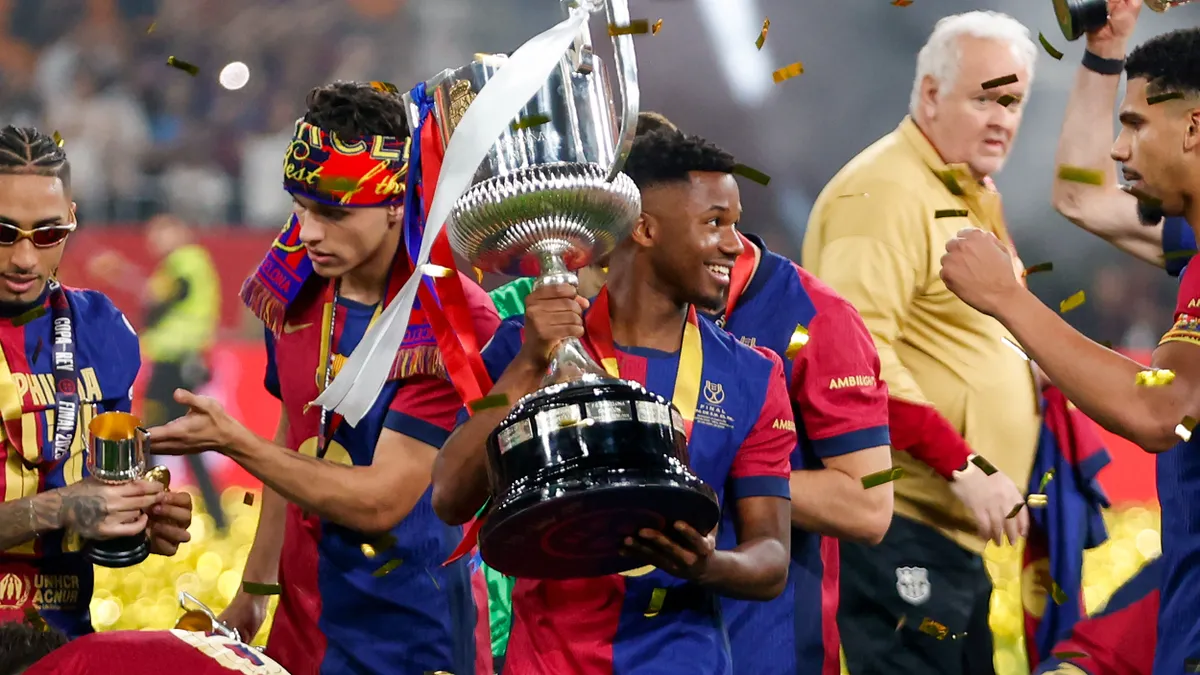 Ansu Fati of FC Barcelona celebrates the victory during the Final Copa del Rey match between Real Madrid and FC Barcelona at La Cartuja in Seville, Spain, on April 26, 2025. (Photo by Jose Luis Contreras/Dax Images/NurPhoto) (Photo by DAX Images / NurPhoto via AFP)