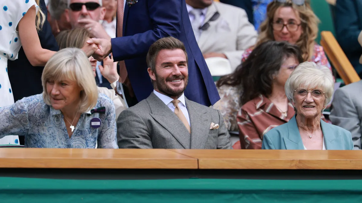 Sir David Robert Joseph Beckham, front center, watches the first round of the men's singles match between Jannik SINNER of Italy and Miomir KECMANOVI? of Serbia on day one of the Wimbledon Championships at the All England Lawn Tennis and Croquet Club in London, on June 29, 2026. ( The Yomiuri Shimbun ) (Photo by Kentaro Tominaga / The Yomiuri Shimbun via AFP)