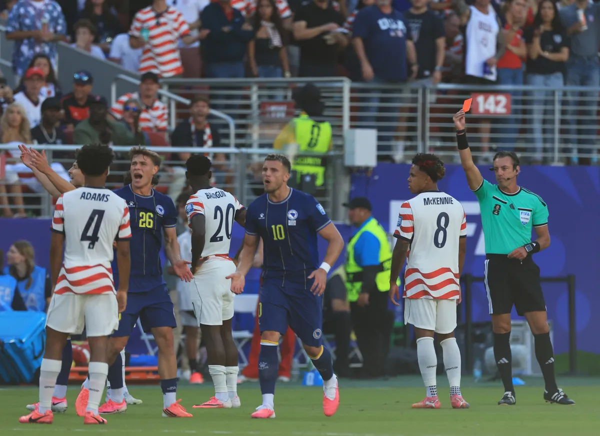 SANTA CLARA, CALIFORNIA - JULY 1: Folarin Balogun of United States is shown a red card by Referee Raphael Claus during the FIFA World Cup 2026 Round Of 32 match between USA and Bosnia and Herzegovina at San Francisco Bay Area Stadium on July 1, 2026 in Santa Clara, United States. (Photo by MB Media/Getty Images)