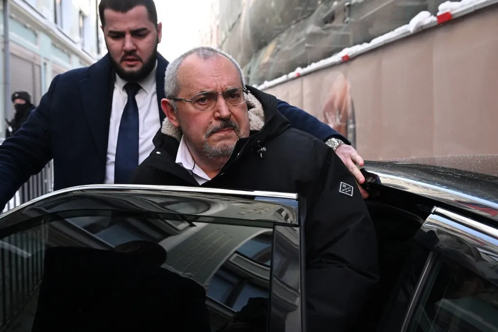 Boris Nadezhdin, the Civic Initiative Party presidential hopeful, leaves in a car following a meeting at the Central Election Commission in Moscow on February 8, 2024. Russia's election commission on February 8, 2024 blocked pro-peace politician Boris Nadezhdin from running in next month's presidential election, the candidate said in a post on social media. (Photo by NATALIA KOLESNIKOVA / AFP)