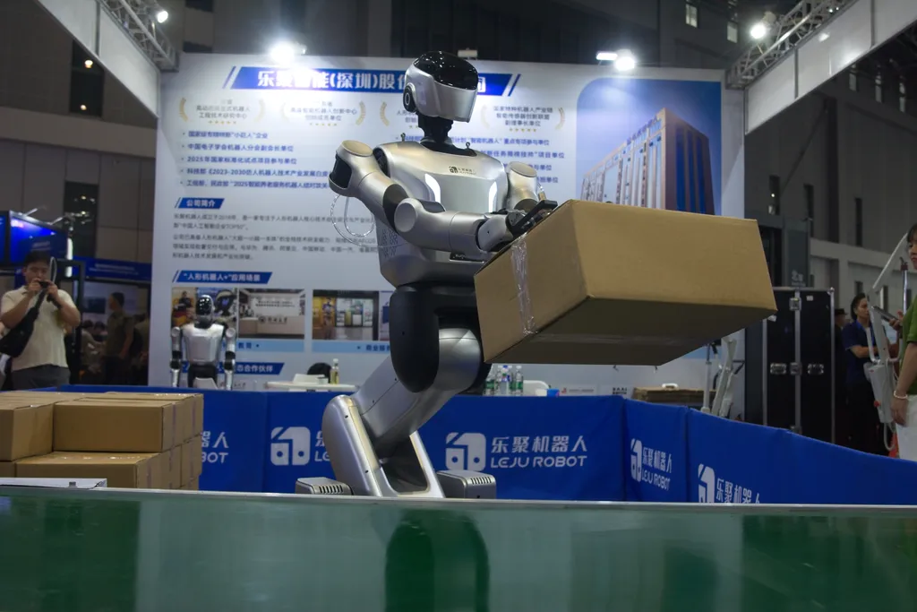 A Leju robotics device carries a package at the Leju robotics stand during the first day of the CIEI digital expo trade fair at the National Exhibition Center in Shanghai, China, on July 2, 2026. (Photo by Ying Tang/NurPhoto via Getty Images) robot