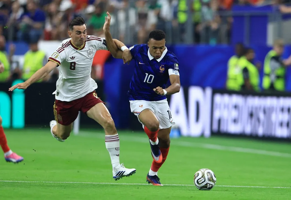 Kylian Mbappe of France, #10, and Fabian Ruiz of Spain compete for the ball during the first half of the FIFA World Cup 2026 semi-final match between France and Spain at Dallas Stadium in Arlington, Texas, on July 14, 2026. ( The Yomiuri Shimbun ) (Photo by Takuya Matsumoto / The Yomiuri Shimbun via AFP)