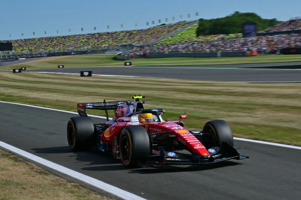 Ferrari's British driver Lewis Hamilton leaves the track during the sprint qualifying session ahead of the Formula One British Grand Prix at the Silverstone motor racing circuit in Silverstone, central England, on July 3, 2026. (Photo by Andrej ISAKOVIC / AFP)