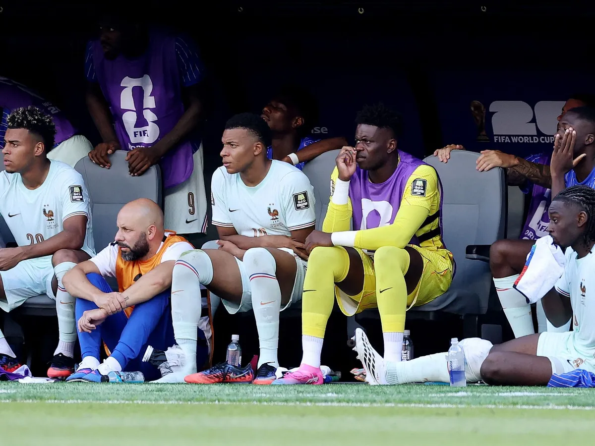 FOXBOROUGH, MASSACHUSETTS - JULY 09: Kylian Mbappe #10 of France is seen on the bench with an ice pack on his right ankle during the FIFA World Cup 2026 Quarter Final match between France and Morocco at Boston Stadium on July 09, 2026 in Foxborough, Massachusetts.   Kevin C. Cox/Getty Images/AFP (Photo by Kevin C. Cox / GETTY IMAGES NORTH AMERICA / Getty Images via AFP)