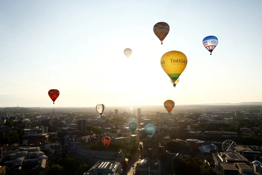 Balloons take to the skies over Bristol, this morning.  July 20, 2026. //  The countdown is on for the Bristol International Balloon Fiesta.  Free-to-attend, the fiesta at the Ashton Court Estate, will take place from Friday 7 to Sunday 9 August, 2026. 
P