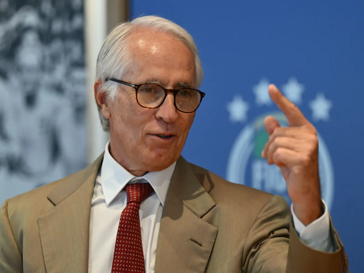 The President of the Italian Football Federation (FIGC) Giovanni Malago gives a press conference to introduce Roberto Mancini  as the new head coach of the Italy men's National Football Team, in Rome on July 28, 2026. (Photo by Alberto PIZZOLI / AFP)