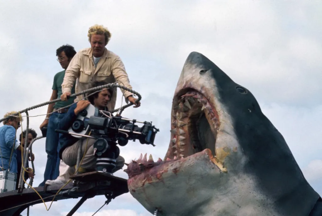 Jaws
Year : 1975 USA
Director : Steven Spielberg
Steven Spielberg
Shooting picture
Restricted to editorial use. See caption for more information about restrictions.
It is forbidden to reproduce the photograph out of context of the promotion of the film. It must be credited to the Film Company and/or the photographer assigned by or authorized by/allowed on the set by the Film Company. Restricted to Editorial Use. Photo12 does not grant publicity rights of the persons represented. (Photo by 7e Art/Zanuck/Brown / Photo12 via AFP)