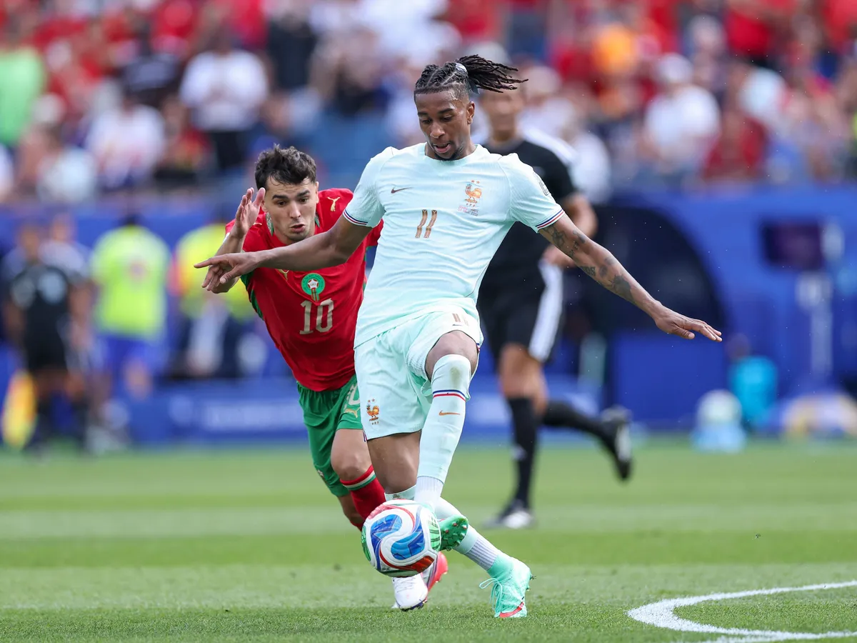 FOXBOROUGH, MASSACHUSETTS - JULY 09: Michael Olise #11 of France controls the ball against Brahim Diaz #10 of Morocco during the FIFA World Cup 2026 Quarter Final match between France and Morocco at Boston Stadium on July 09, 2026 in Foxborough, Massachusetts.   Kevin C. Cox/Getty Images/AFP (Photo by Kevin C. Cox / GETTY IMAGES NORTH AMERICA / Getty Images via AFP)