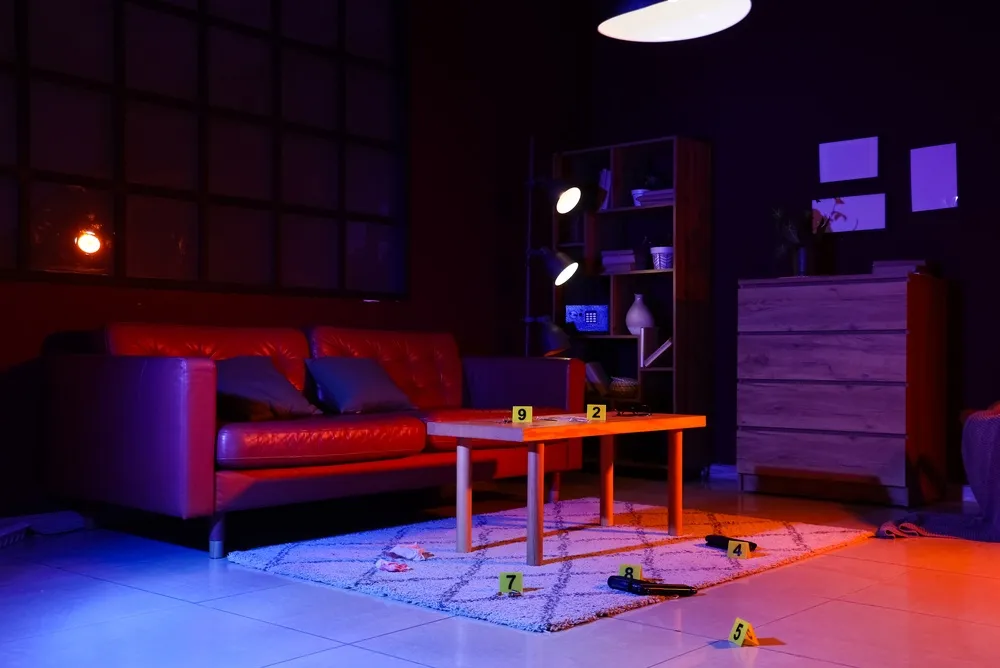Crime scene investigation with evidence markers in dark room, forensic science and criminal justice concept, forensic science and criminal justice concepts are highlighted by the careful