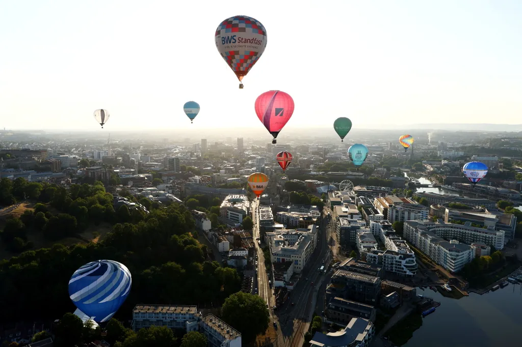 Balloons take to the skies over Bristol, this morning.  July 20, 2026. //  The countdown is on for the Bristol International Balloon Fiesta.  Free-to-attend, the fiesta at the Ashton Court Estate, will take place from Friday 7 to Sunday 9 August, 2026. 
P