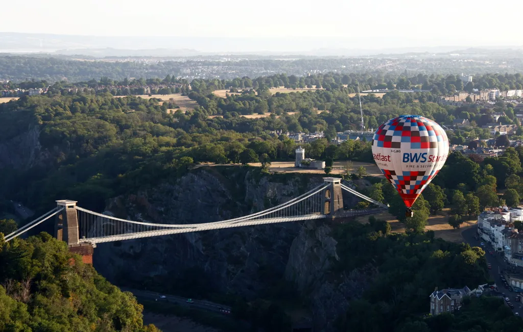 Balloons take to the skies over Bristol, this morning.  July 20, 2026. //  The countdown is on for the Bristol International Balloon Fiesta.  Free-to-attend, the fiesta at the Ashton Court Estate, will take place from Friday 7 to Sunday 9 August, 2026. 
P