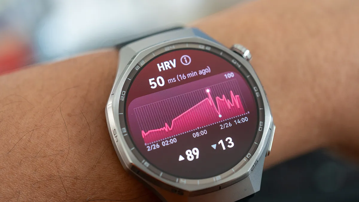 Close-up of a Modern Smartwatch Displaying Heart Rate Variability (HRV) Data on a Person's Wrist