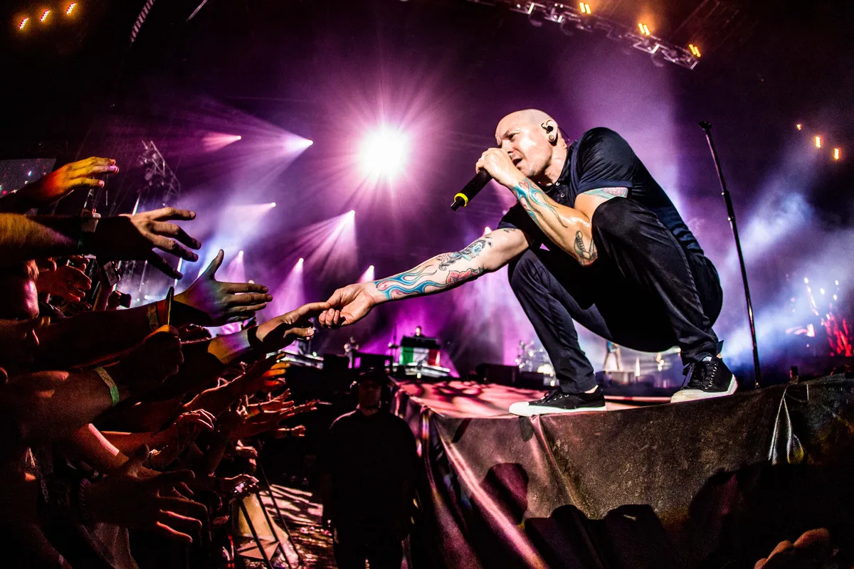 Chester Bennington of the Linkin Park performs live at I-Days Festival in Milano, Italy, on June 17 2017. This was one of the last concerts of Chester Bennington, singer of the group, who committed suicide on July 20, 2017 (Photo by Mairo Cinquetti/NurPhoto) (Photo by Mairo Cinquetti / NurPhoto via AFP)