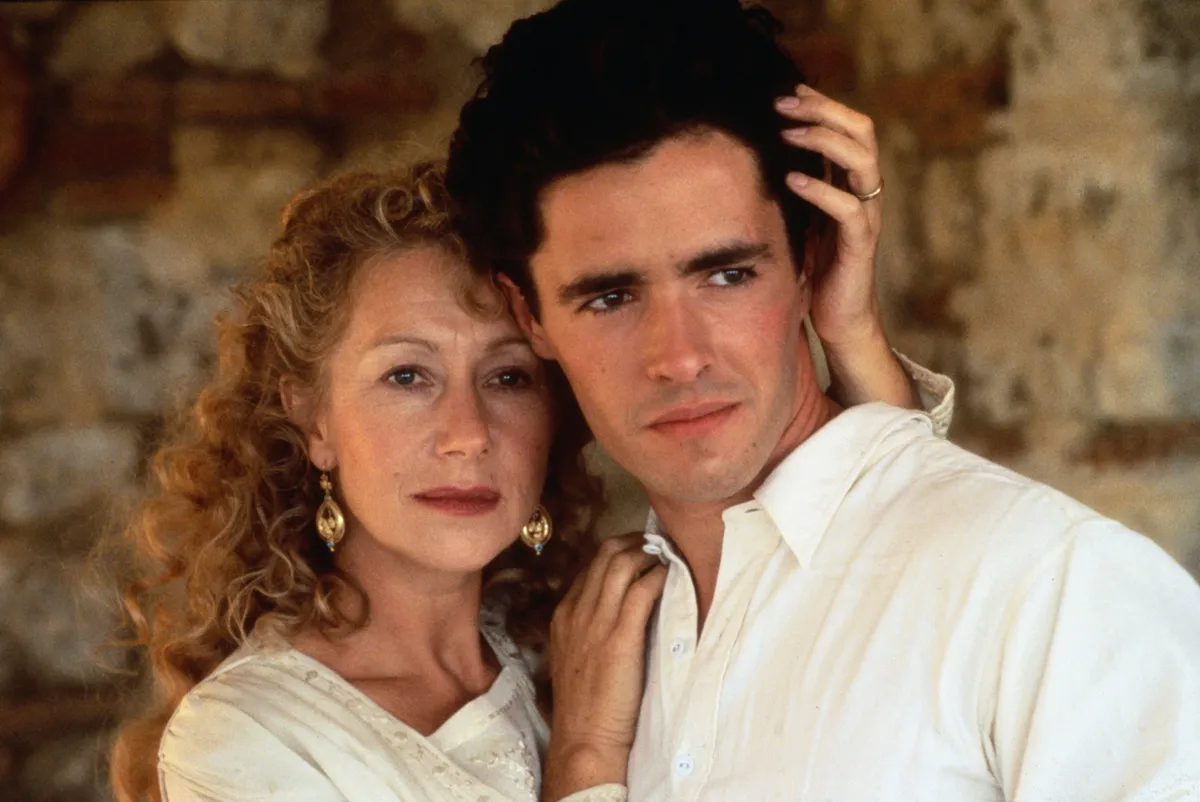 RELEASE DATE: 28 February 1992. MOVIE TITLE: Where Angels Fear to Tread - STUDIO: Compact Films. PLOT: The widow Lilia Herriton meets a young man when she visits Italy and marries him. The man is only a dentist without a good name, and Lilia's relatives are clearly unhappy with her choice. PICTURED: HELEN MIRREN as Lilia Herriton and GIOVANNI GUIDELLI as Gino Carella.