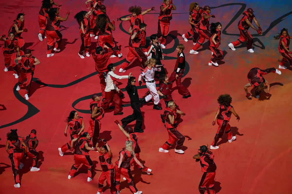 South Korean boy band BTS perform during the halftime show of the 2026 World Cup football tournament final match between Spain and Argentina at the New York/New Jersey Stadium in East Rutherford on July 19, 2026.  (Photo by ANGELA WEISS / AFP)