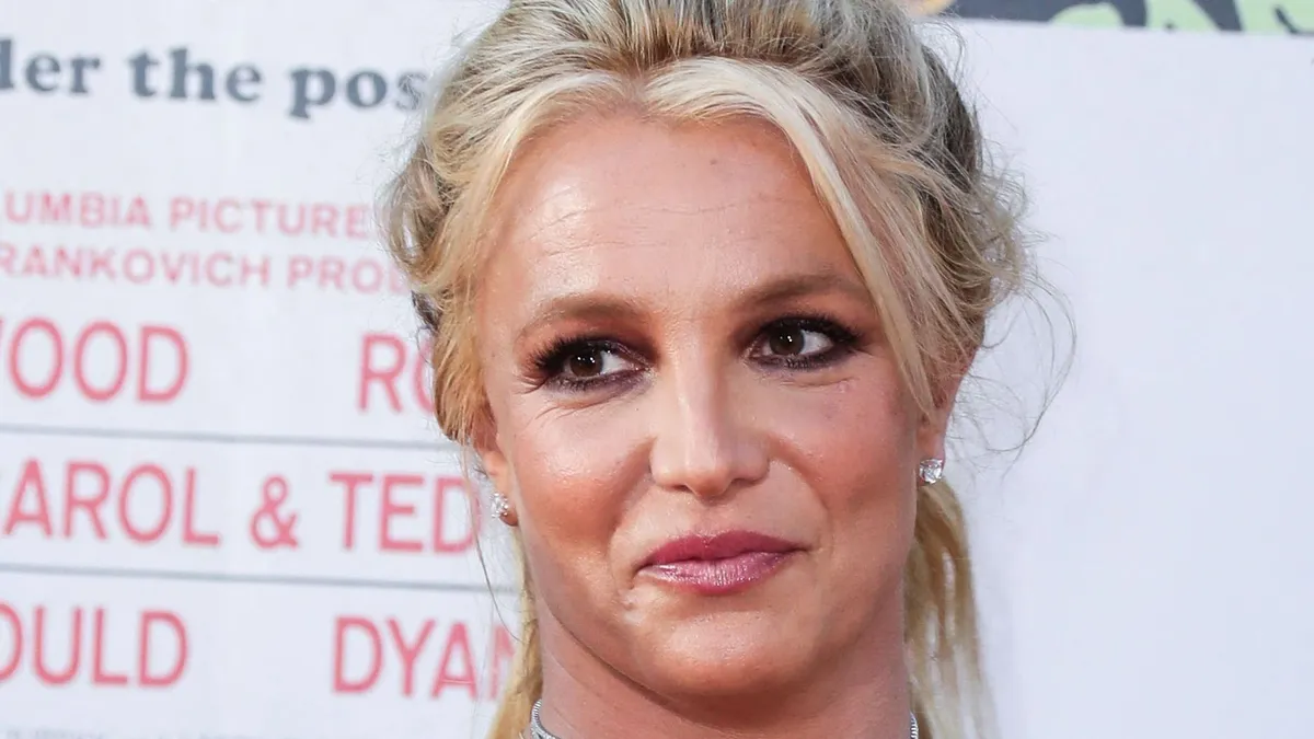 (FILE) Britney Spears Is Engaged to Sam Asghari After Nearly 5 Years Together. HOLLYWOOD, LOS ANGELES, CALIFORNIA, USA - JULY 22: Singer Britney Spears and boyfriend/personal trainer Sam Asghari arrive at the World Premiere Of Sony Pictures' 'Once Upon a Time In Hollywood' held at the TCL Chinese Theatre IMAX on July 22, 2019 in Hollywood, Los Angeles, California, United States. (Photo by Xavier Collin/Image Press Agency/NurPhoto) (Photo by Image Press Agency / NurPhoto via AFP)