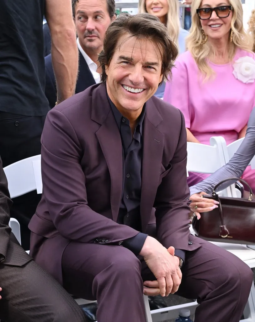 US actor Tom Cruise attends English former footballer David Beckham's Hollywood Walk of Fame star ceremony in Hollywood, California, on June 12, 2026. (Photo by LISA O'CONNOR / AFP)