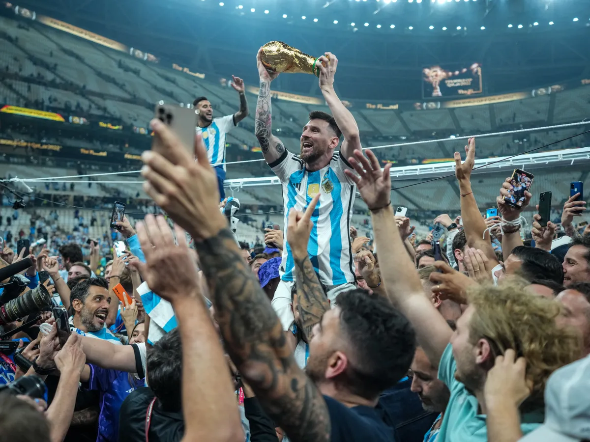 (10)  Lionel Messi of team Argentina celebrates with the world cup trophy during the FIFA World Cup Qatar 2022 Final match between Argentina and France at Lusail Stadium on December 18, 2022 in Lusail City, Qatar.  (Photo by Ayman Aref/NurPhoto) (Photo by Ayman Aref / NurPhoto via AFP)