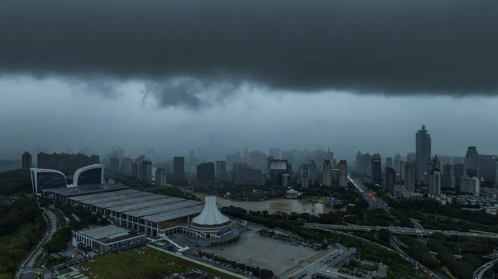 Dark clouds gather over Qingxiu District, Nanning, as heavy rain returns around 5 p.m. on July 6, 2026, after a day of downpour on July 5 caused by Typhoon Maysak. (Photo by Peng Huan / IC photo / Imaginechina via AFP)