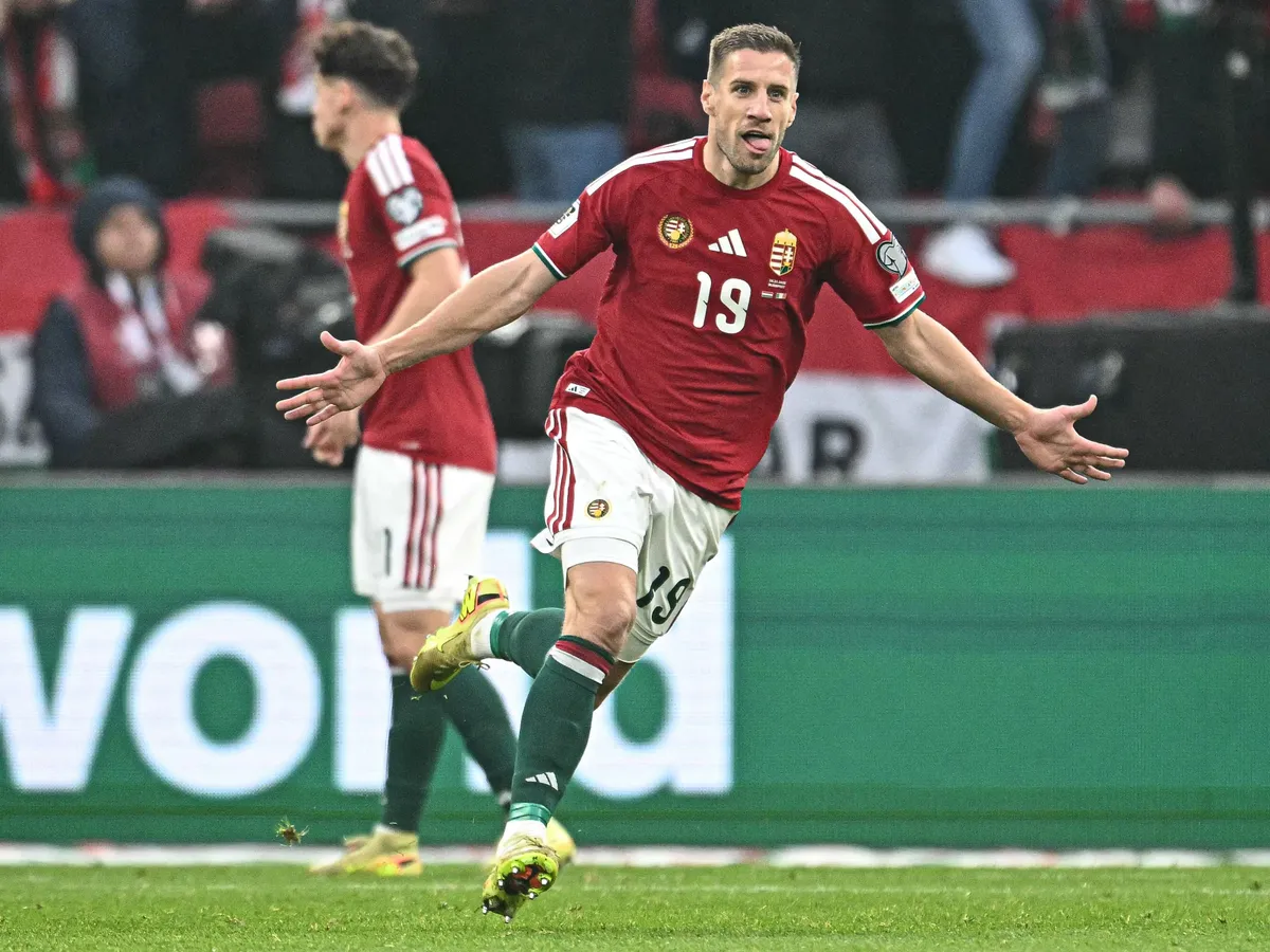 Hungary's forward #19 Barnabas Varga (C) celebrates his 2-1 during the FIFA World Cup 2026 Group F European qualification football match betweem Hungary and Republic of Ireland at the Puskas Arena in Budapest, Hungary on November 16, 2025. (Photo by Attila KISBENEDEK / AFP)