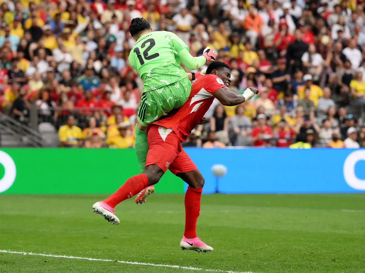 VANCOUVER, CANADA - JULY 07: Camilo Vargas #12 of Colombia and Breel Embolo #7 of Switzerland collide during the FIFA World Cup 2026 Round of 16 match between Switzerland and Colombia at BC Place Vancouver on July 07, 2026 in Vancouver, British Columbia, Canada.   David Ramos/Getty Images/AFP (Photo by David Ramos / GETTY IMAGES NORTH AMERICA / Getty Images via AFP)