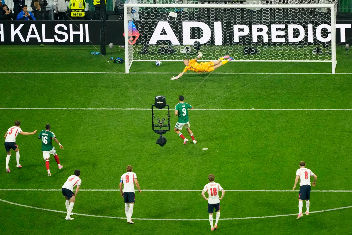 MEXICO CITY, MEXICO - JULY 05: Raul Jimenez #9 of Mexico converts a penalty for his team’s second goal during the FIFA World Cup 2026 Round of 16 match between Mexico and England at Mexico City Stadium on July 05, 2026 in Mexico City, Mexico. (Photo by Osvaldo Aguilar - FIFA/FIFA via Getty Images)